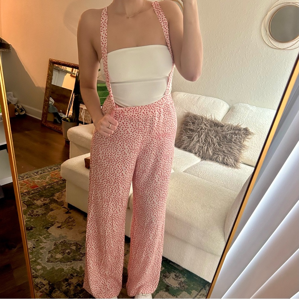Re: named floral print loose overalls. Size medium.